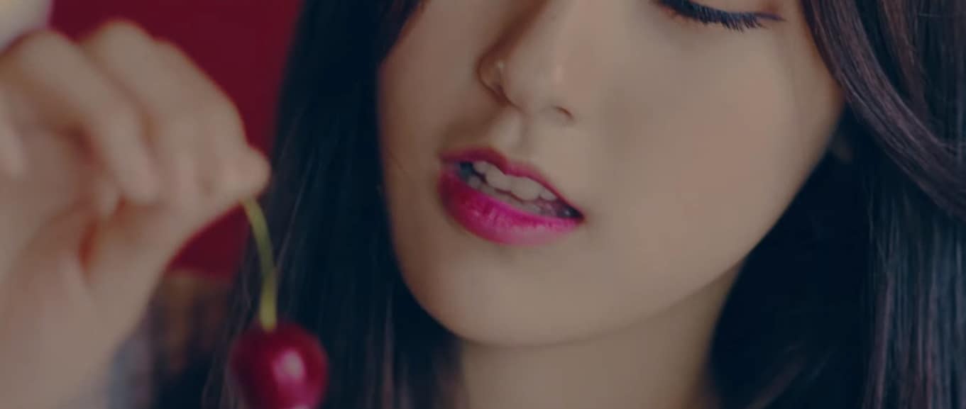 Loona Choerry eating a cherry photo Loona Love Cherry Motion MV Reveals Member Choerry
